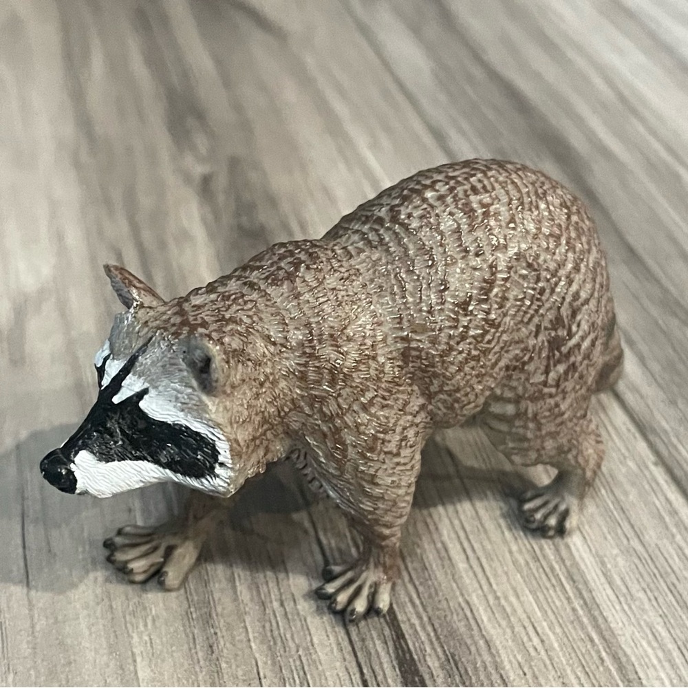 Realistic Brown Raccoon Figurine